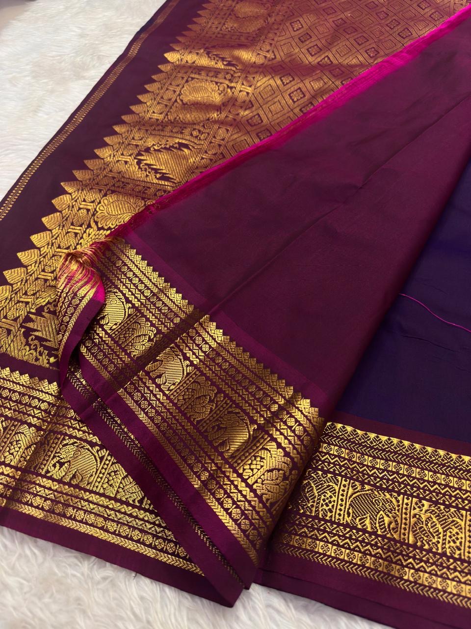 Imperial violet Kanchi pattu saree with rich traditional zari korvai border