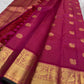 Broad classic-gold Kanchipuram border with large repeating Maanga motifs arranged inside architectural panels.