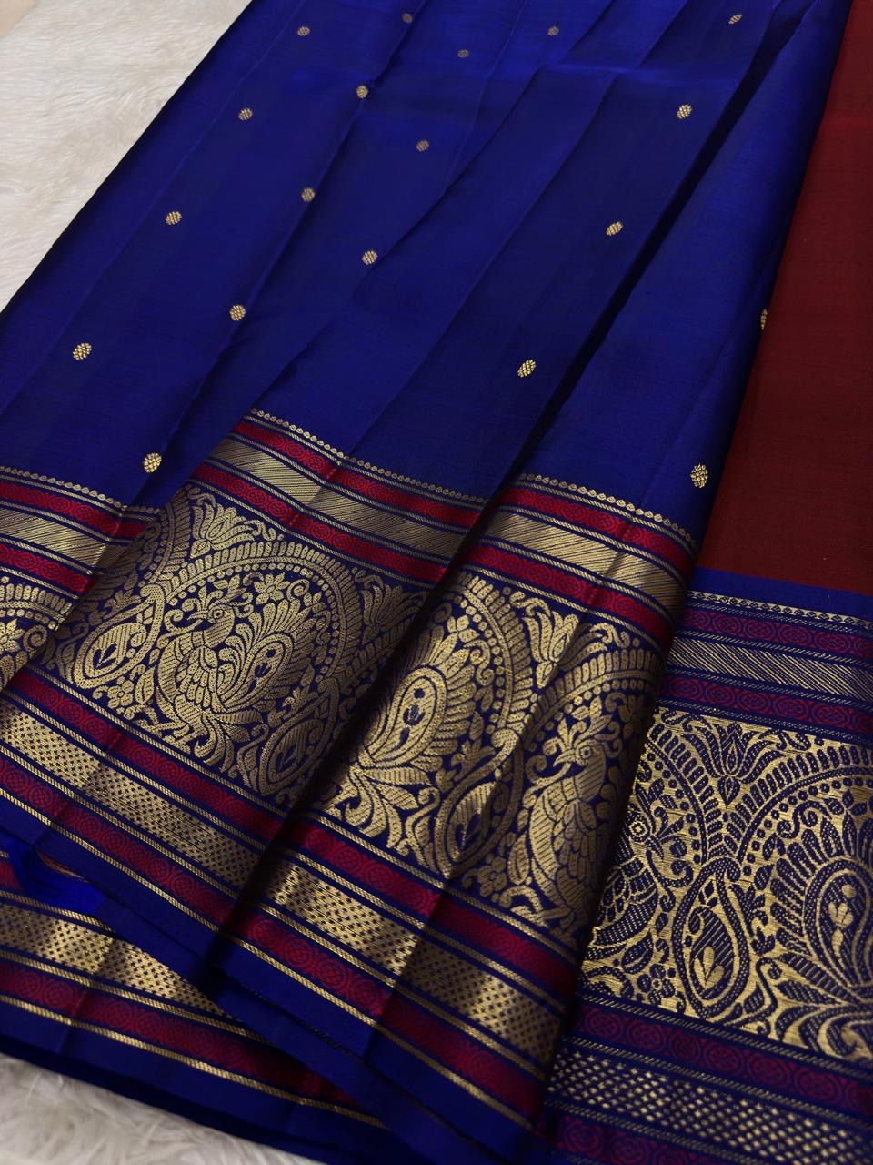 Magenta and Royal Blue Handwoven Pure Silk Kanchipuram Saree with Sorgavaasal Mayil Border