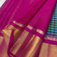 Full pallu view in magenta with gold zari stripes and a wide gold zari panel near the border (available in the USA)