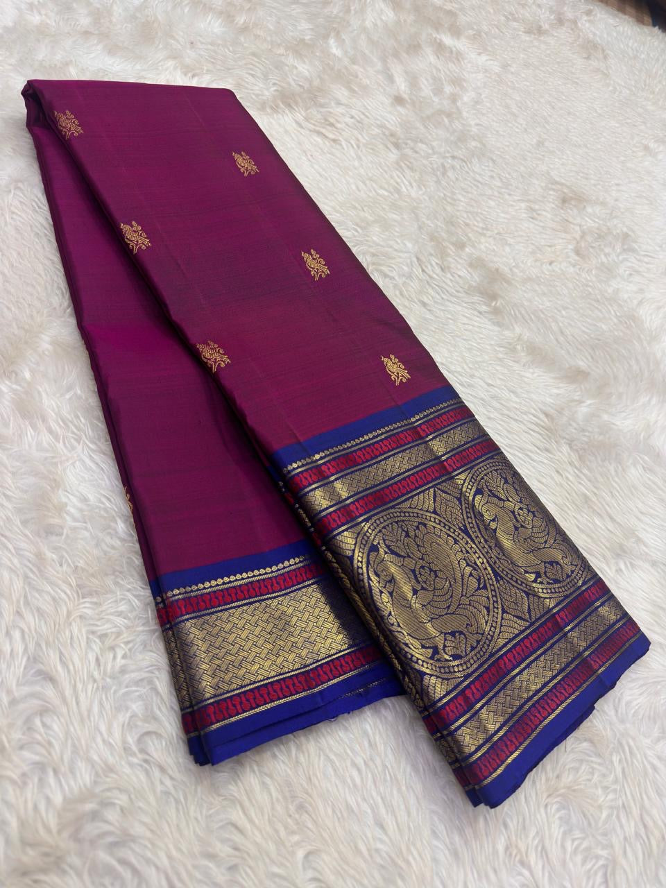 Magenta Kanchipuram silk saree with sorgavaasal mayil border detail – Idam Living