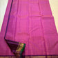 Gold zari floral butta detail on magenta Korvai saree body