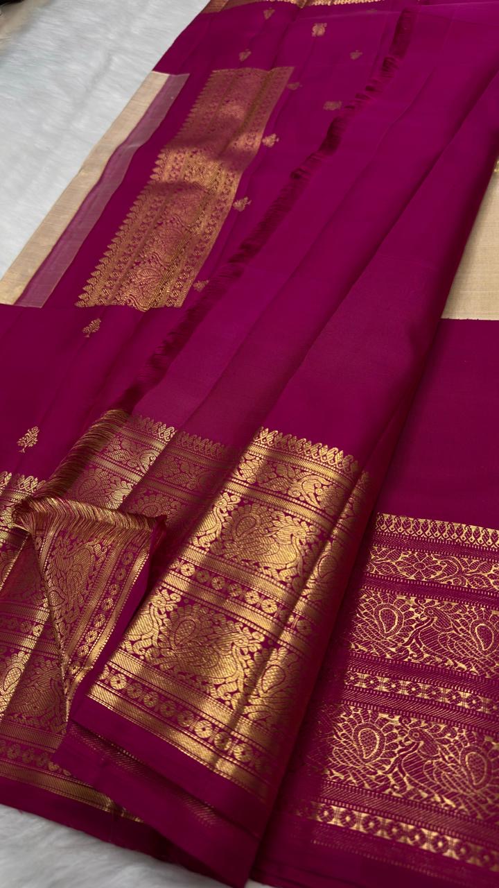 Magenta Handwoven Pure Silk Kanjeevaram Saree with Gold Korvai Peacock Border