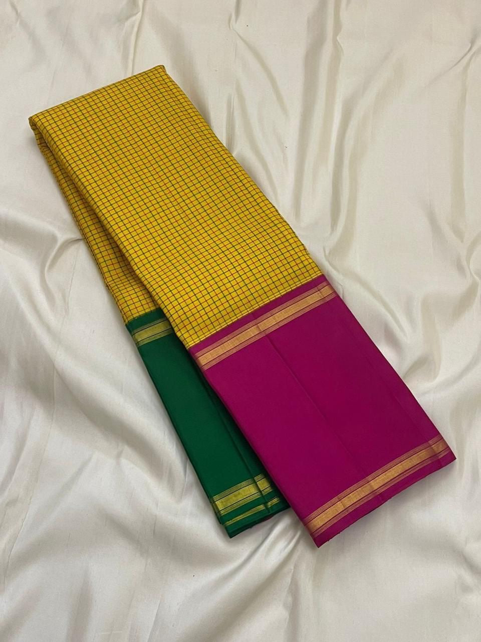 sunflower yellow kanchipuram silk saree body with fine grid checks and green selvedge