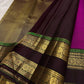 Magenta silk body detail showing larger gold zari buttas.