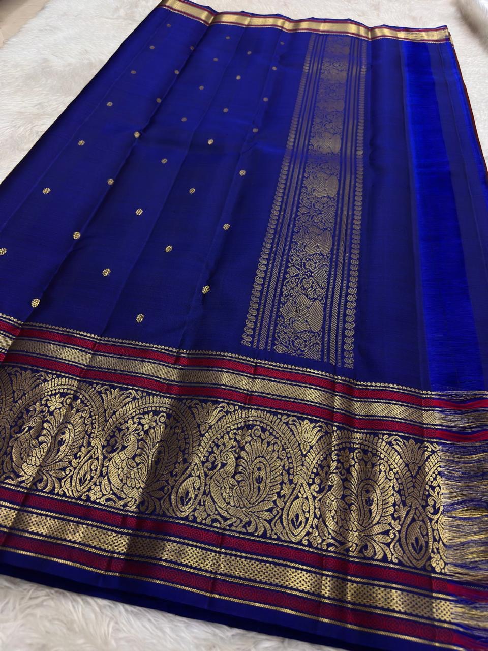 Magenta and Royal Blue Handwoven Pure Silk Kanchipuram Saree with Sorgavaasal Mayil Border