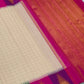 Vivid magenta and deep purple Ettukol border with stepped gold zari forms on Warm Ivory Kanchipuram silk.
