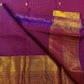 Rich gold zari pallu of magenta purple Kanchipuram saree