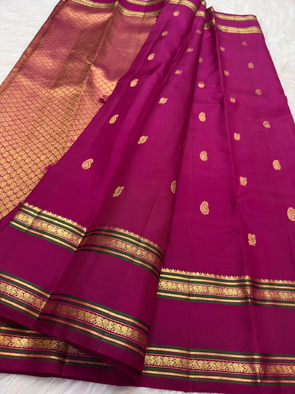 Vadamalli Magenta Handwoven Pure Silk Kanjivaram Rettapet Saree with Green-Accented Gold Zari Border