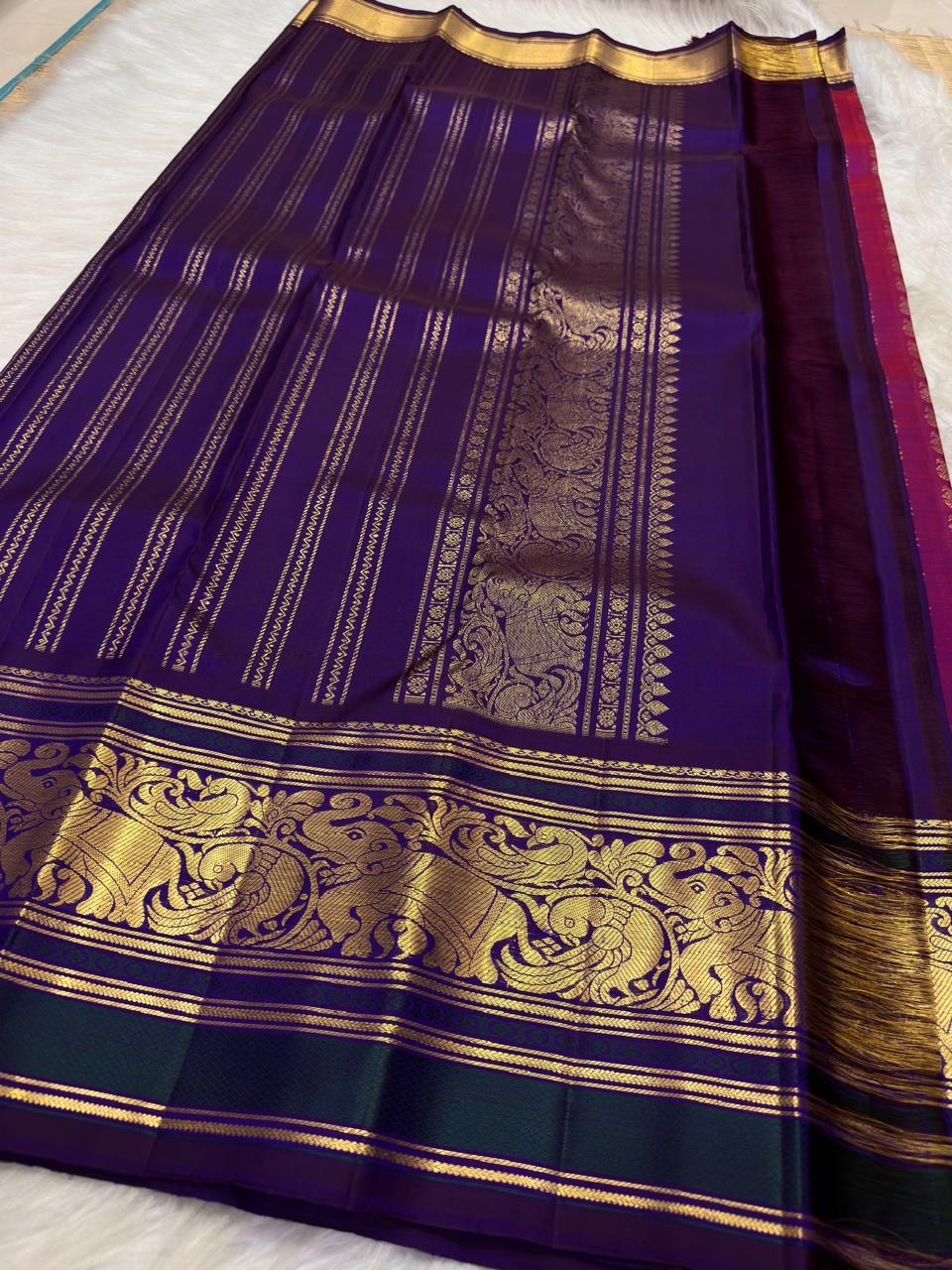 Vadamalli magenta Kanchipuram saree with royal blue contrast border