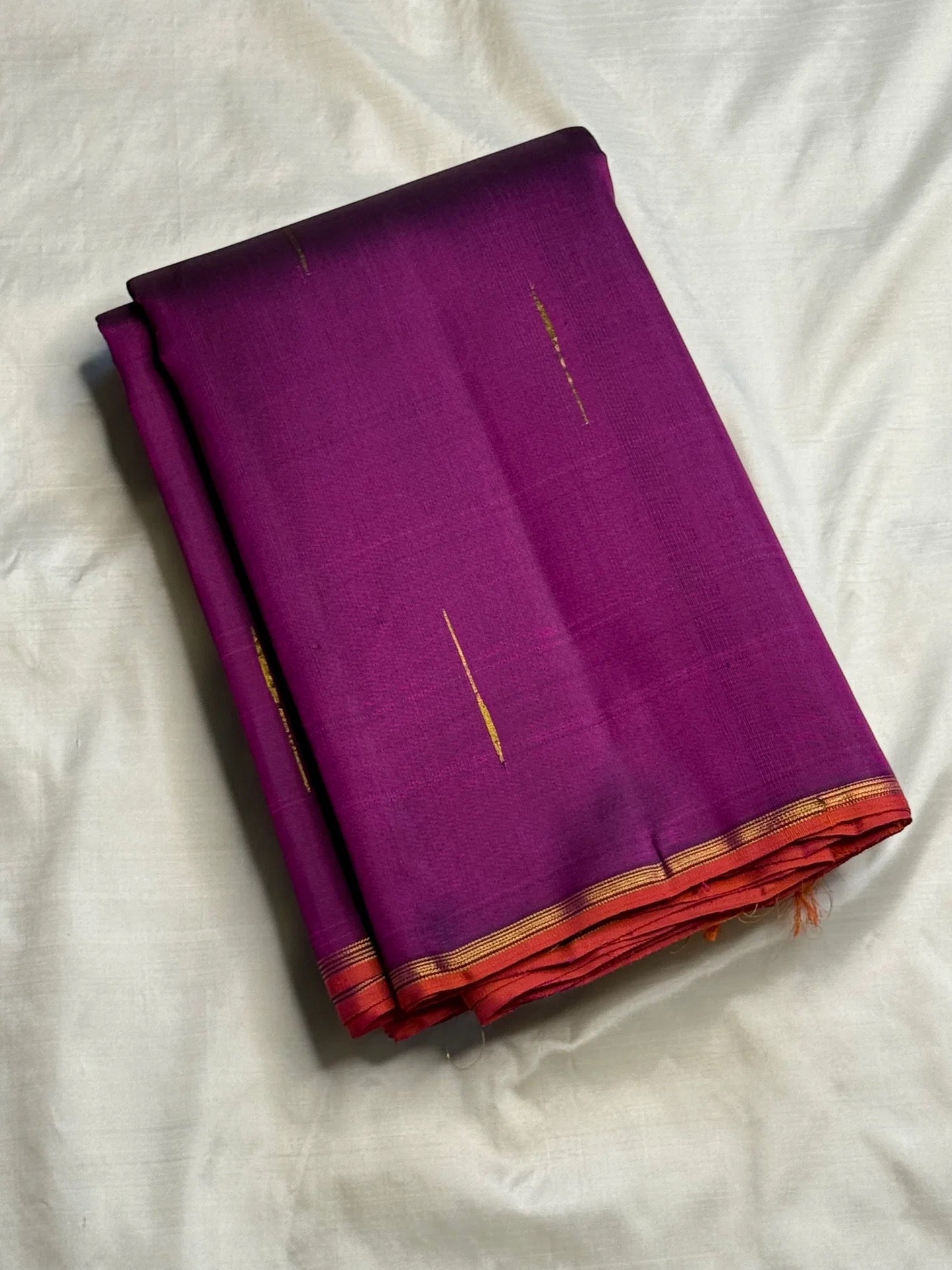 Magenta Violet Handwoven Pure Silk Kanjeevaram Saree with Malli Moggu Buttas and Coral Orange Pallu