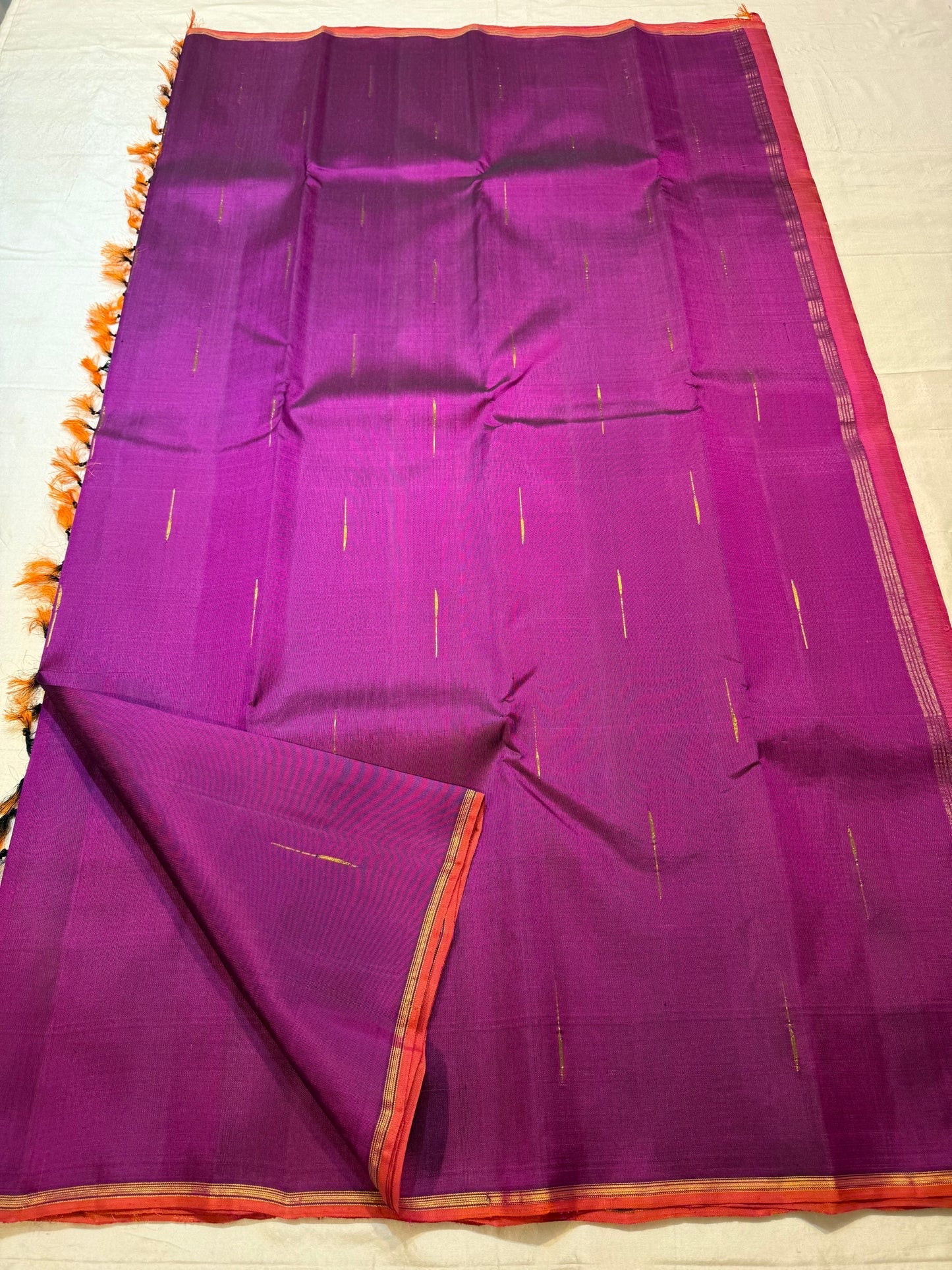 Magenta Violet Handwoven Pure Silk Kanjeevaram Saree with Malli Moggu Buttas and Coral Orange Pallu