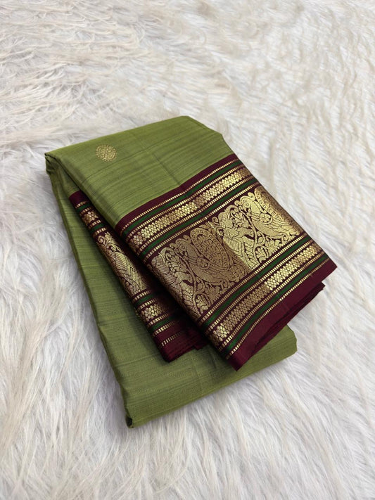 Tender Ilai Pachai Green Pure Silk Kanchi Pattu Peacock Butta Saree with Maroon Border – view 1