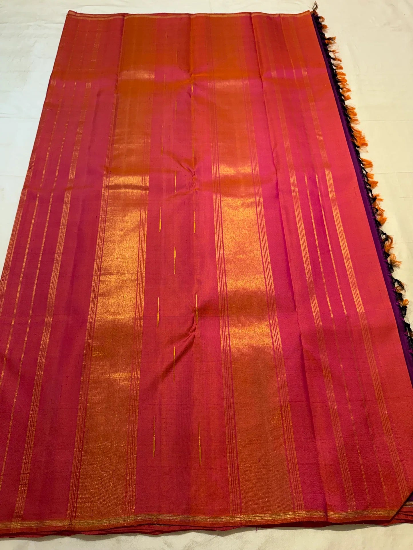 Magenta Violet Handwoven Pure Silk Kanjeevaram Saree with Malli Moggu Buttas and Coral Orange Pallu