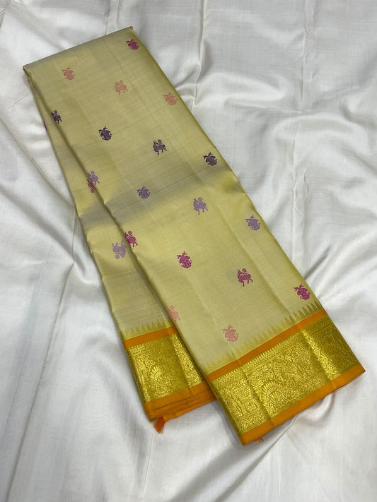Mango-green zari pallu of a Warm Ivory Pure Silk Kanjipuram saree - Idam Living