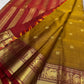 Deep Arakku Kanchipuram pallu with long vertical zari seer lines and repeated ornamental zari registers.