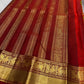 Close view of the deep Arakku pettu with bold Yazhi-inspired motifs and rich gold zari detailing.