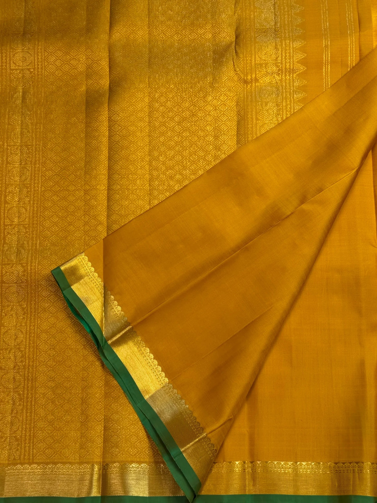 Pallu of manjal turmeric gold Kancheepuram pure silk saree
