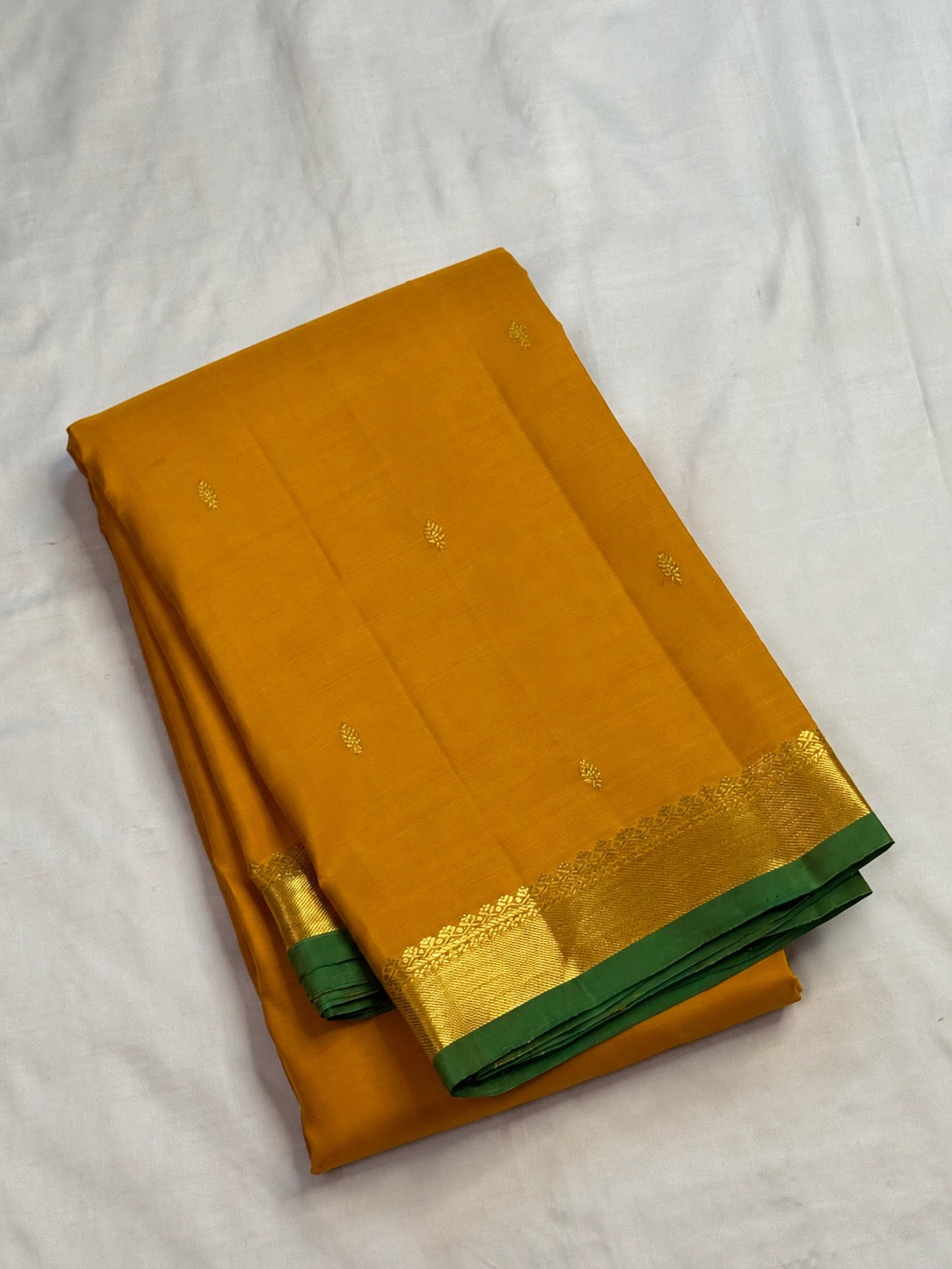 Manjal turmeric gold handwoven pure silk Kancheepuram butta saree with small zari border, full view