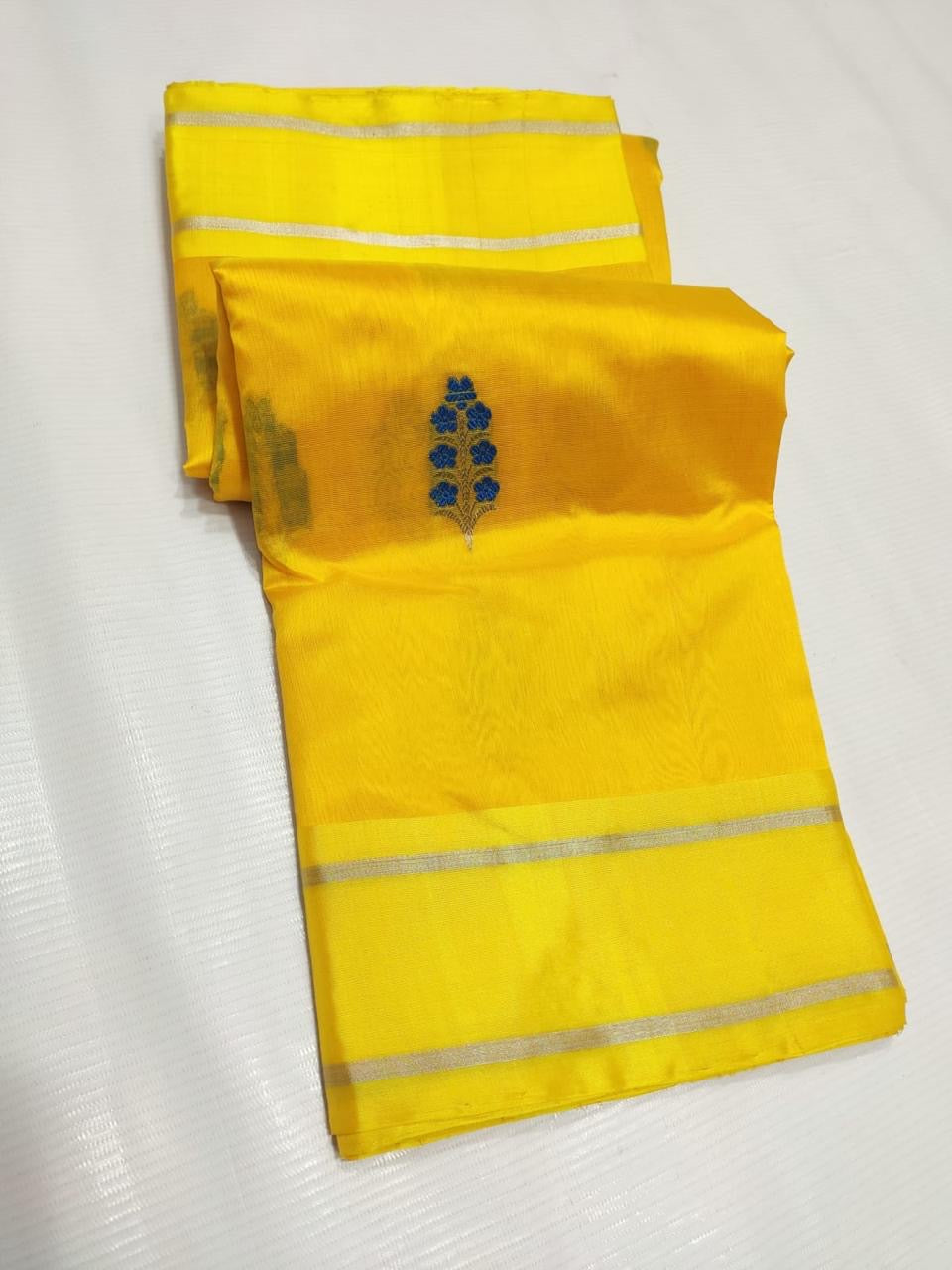 Manjal yellow Chanderi saree with fine silver-toned border lines