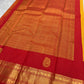 Manjal Yellow Kanjivaram silk saree with gold-zari ornament.