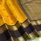 Turmeric Yellow Handwoven Pure Silk Kanchipuram Saree with Rettapet Border and Mayil Chakram, contrasting zari border detail