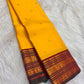 Manthulir green selvedge detail, Manjal yellow Kancheepuram Korvai saree