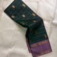 Maragatham-green Pure Silk Kanjipuram Rettapet saree with cool lavender-mauve border and gold zari.