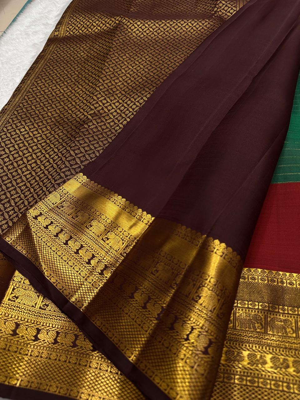 Maragatham Green Pure Silk Kanchipuram saree with deep Paaku Brown contrast.