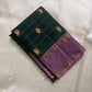Detailed twin-register border on a Maragatham-green Pure Silk Kanjipuram saree.