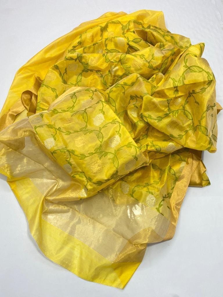 Marigold-yellow Pattu Silk Chanderi saree body with leaf-green patterns