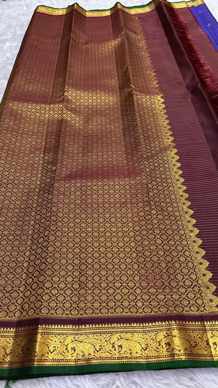 Maroon Brown Kanchipuram border with Yaanai and Kodi Valli gold zari motifs