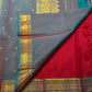 Maroon Butta Kancheepuram silk saree folded, showing full drape and border