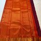 Gold-zari medallion detailing within the Orange border.
