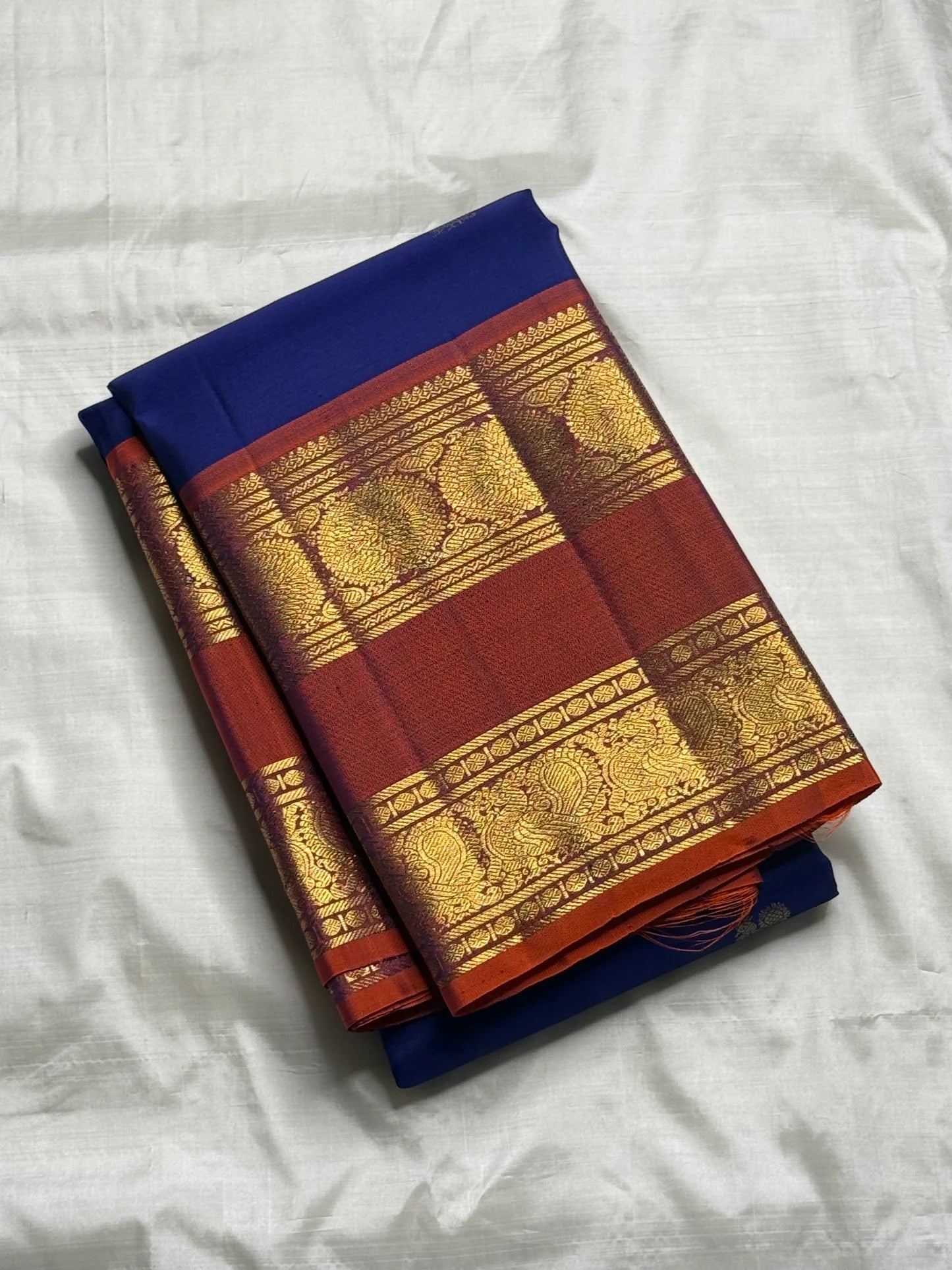 Arakku red korvai border with dense gold zari panels on royal blue Kanchipuram silk saree — Idam Living