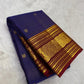 folded royal blue checked kanchipuram silk saree with maroon zari woven border