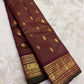 Close-up of maroon Kanjivaram silk saree body showing gold zari vairaoosi weave and mayil peacock butta — Idam Living