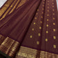 Close-up of mayil peacock butta motif in gold zari on maroon Kanjivaram handwoven silk saree — Idam Living