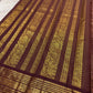 Rich dense gold zari pallu of handwoven maroon Kanjivaram lightweight silk saree — Idam Living