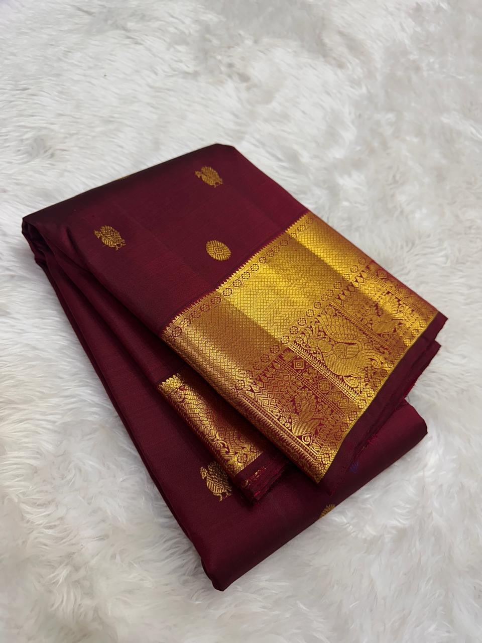 Maroon handwoven pure silk Kanjipuram saree with gold Mayil Chakram butta — Idam Living