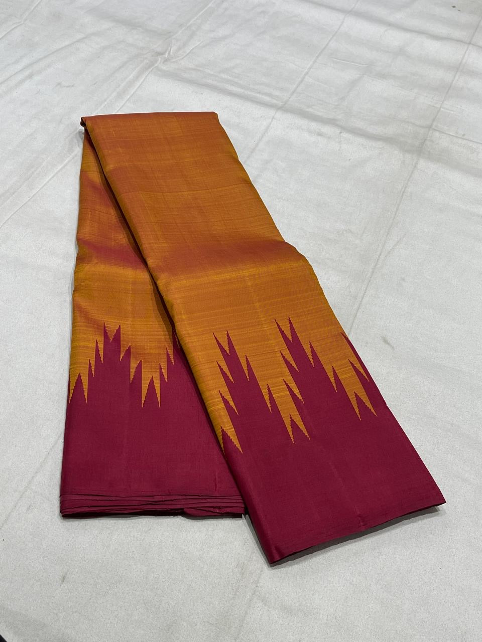 Kanjivaram silk saree in maroon with mustard border Thazhampoo Reku weave draped view