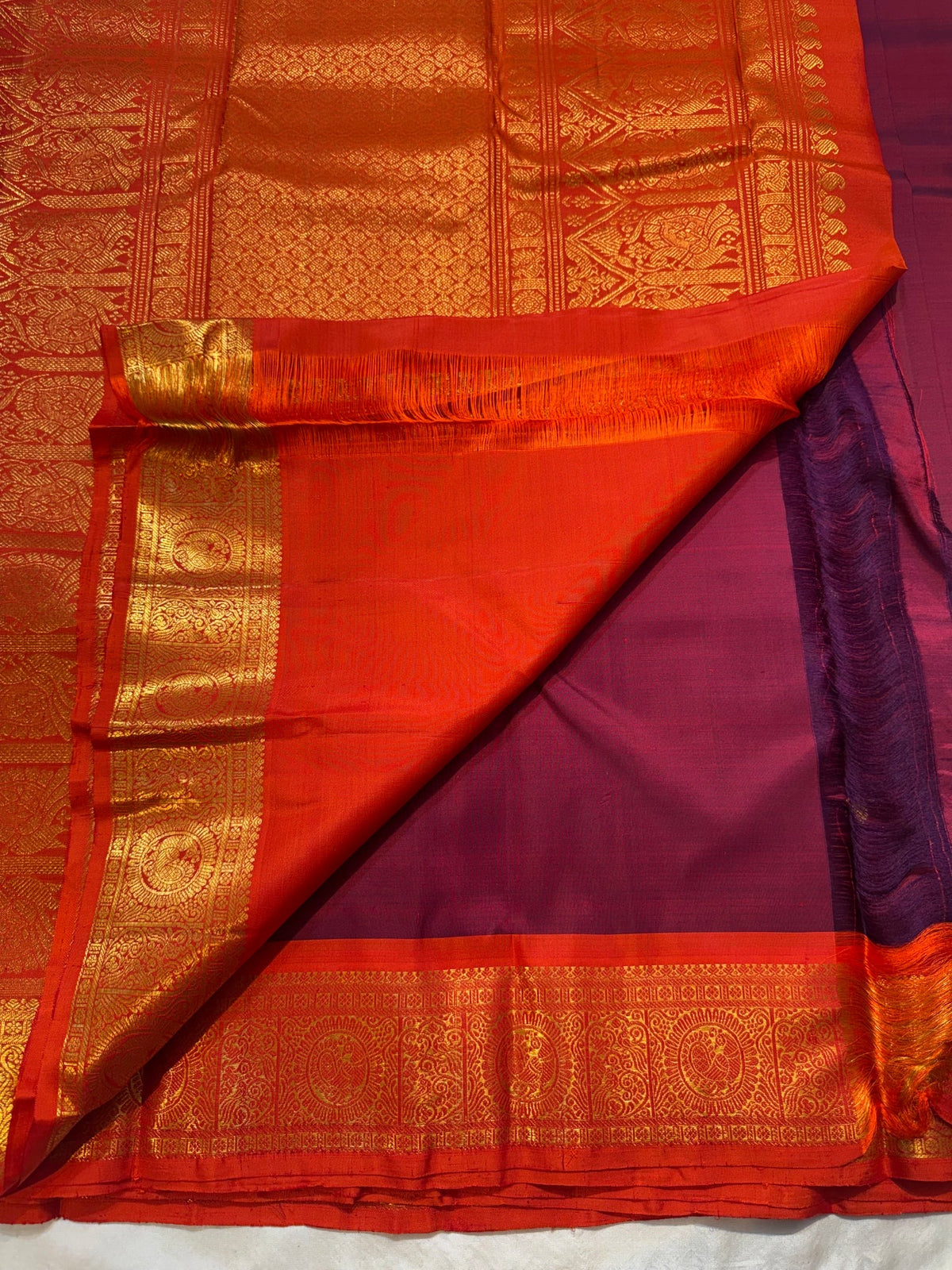 Handwoven Deep Ennai Arakku Pure Silk Kanchipuram.