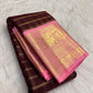 Maroon Pure Silk Kanchipuram saree with traditional gold zari work.