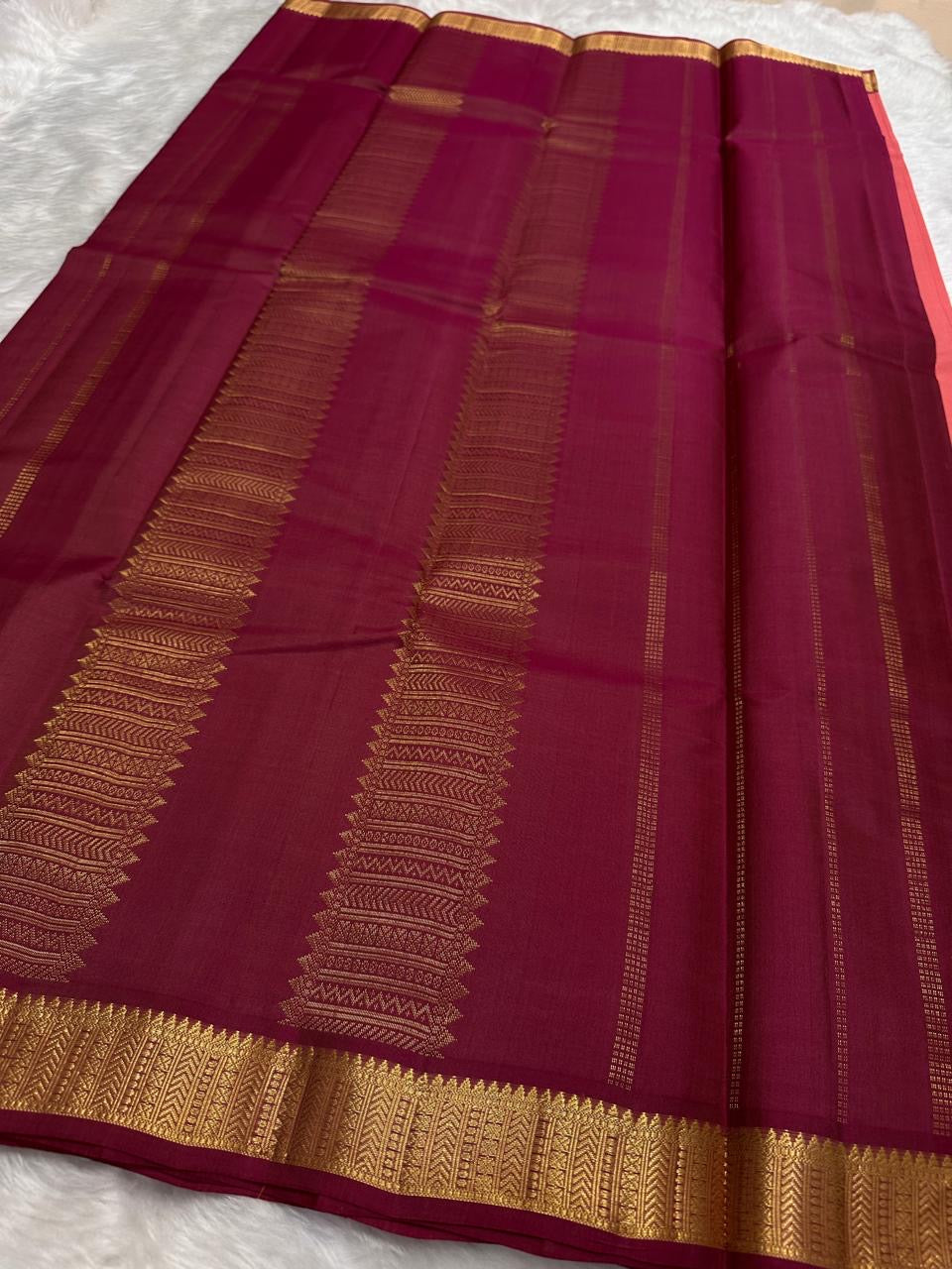 maroon pallu close view showing gold zari detailing on pure kanchipuram silk saree shipped from New Jersey USA