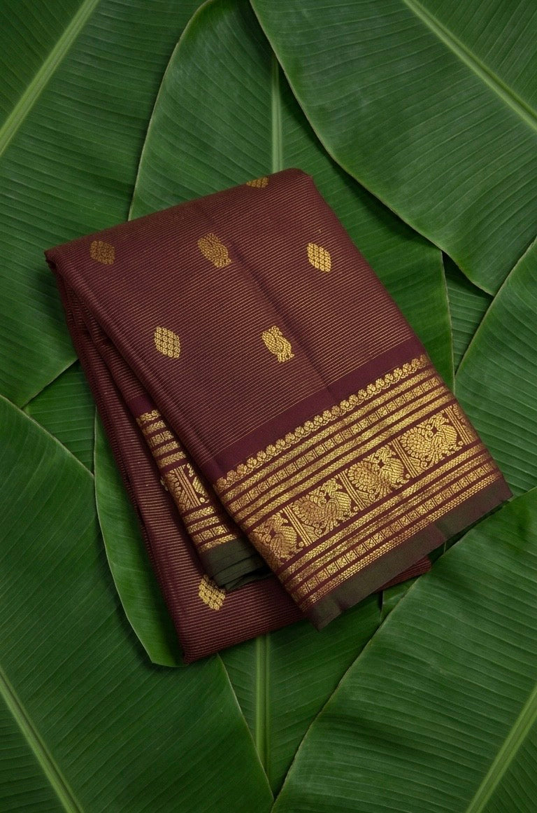 Maroon lightweight Kanchipuram silk saree with gold zari vairaoosi weave and mayil butta, handwoven in Kanchipuram — Idam Living