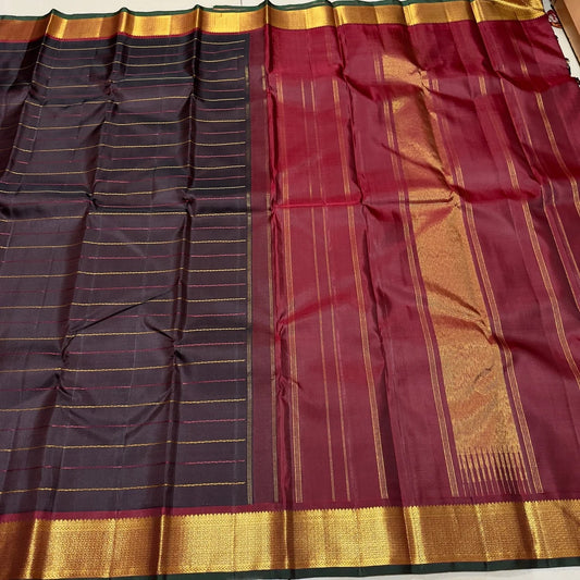 Border detail of the Coffee Brown Handwoven Pure 2G Jari Kanjivaram Saree with Neli Veldhari Body and Maroonish Brown Borders.