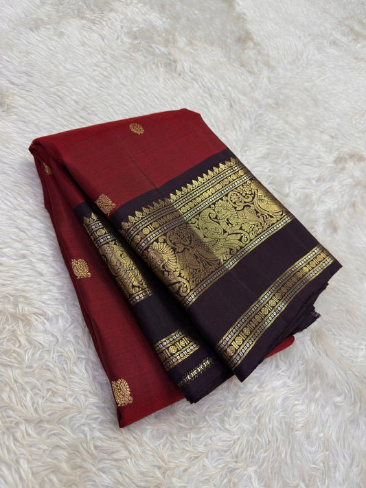 Arakku Red and Deep Maroon Handwoven Pure Silk Kanjeevaram Saree with Mayil Butta and Vanasringaram Silk Thread Border