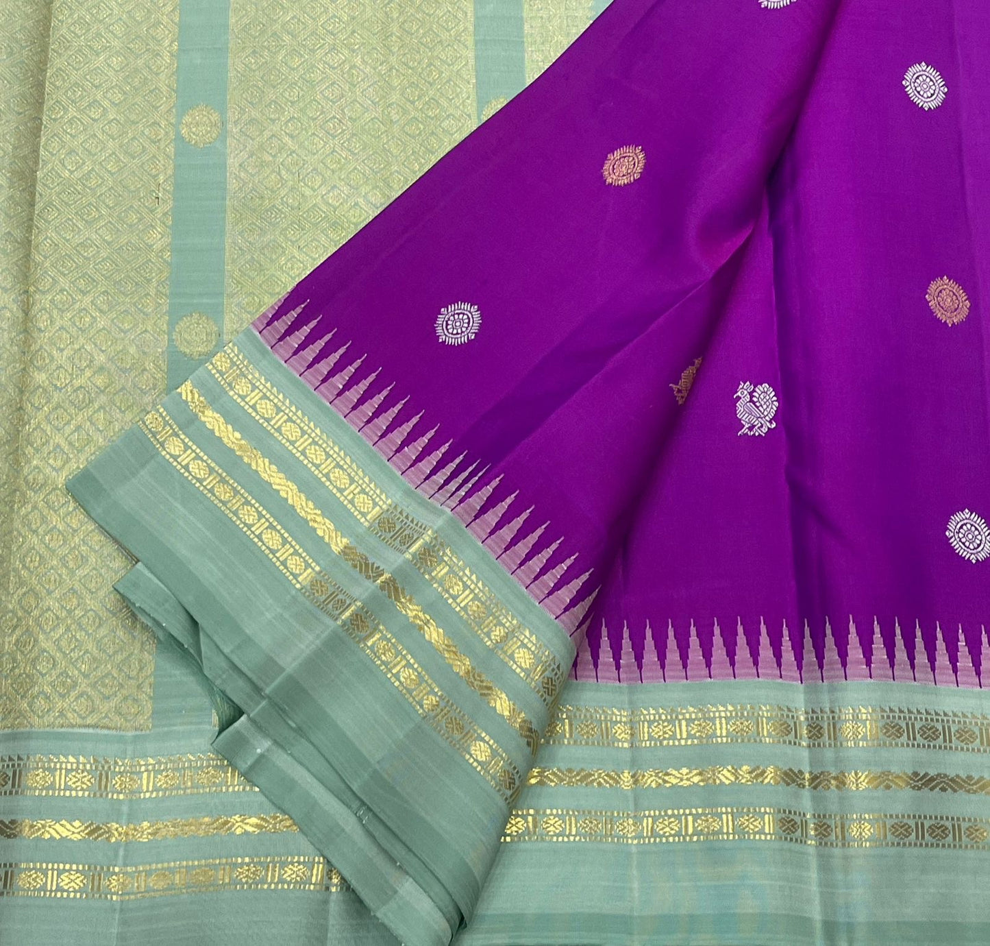 Ice blue pallu of orchid purple Kanjipuram pure silk saree with antique gold zari Varisaipet cascade