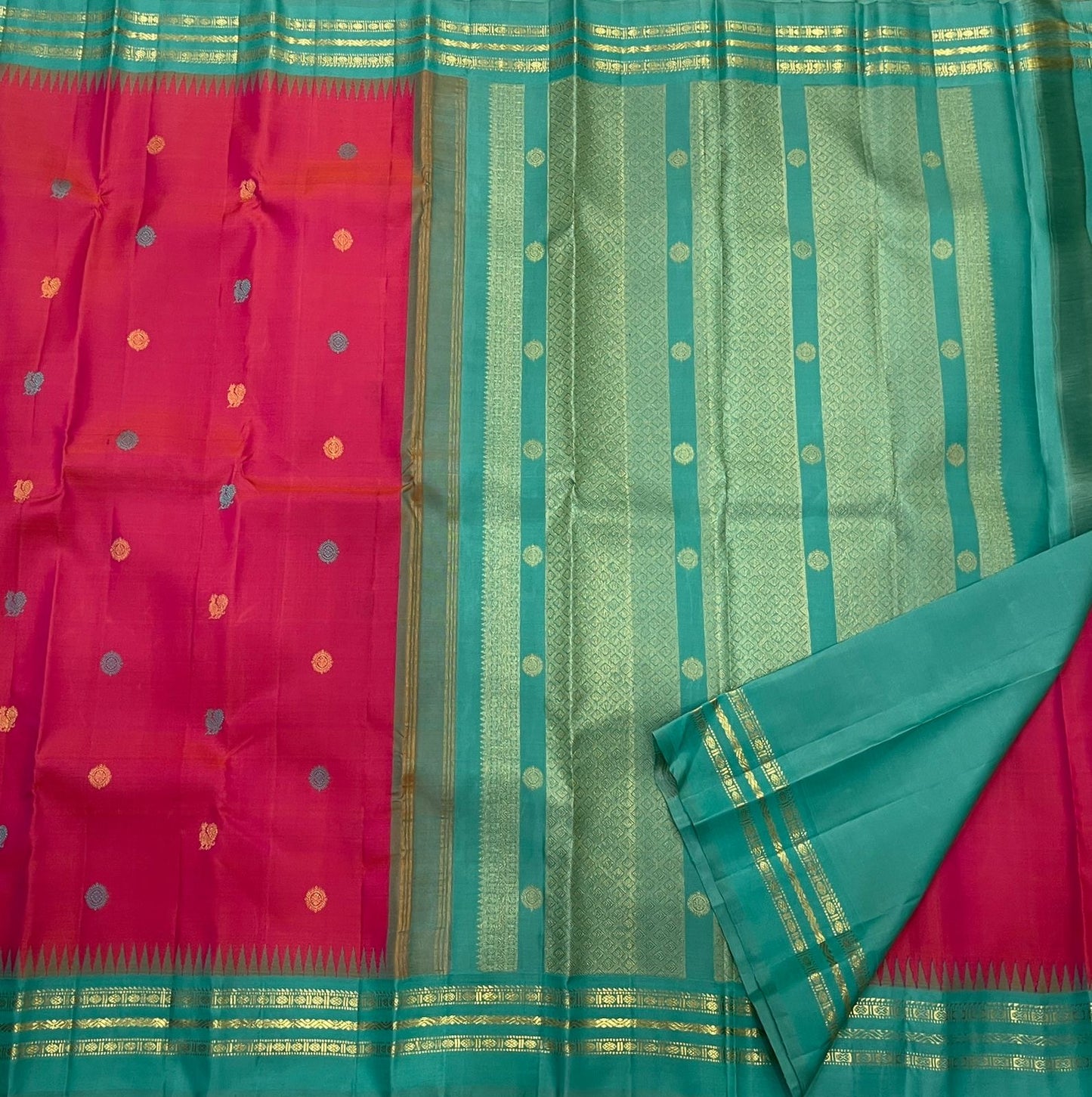 Teal Korvai border of shot colour tomato red pink Kancheepuram saree with Kaal Irangiya temple edge antique gold zari