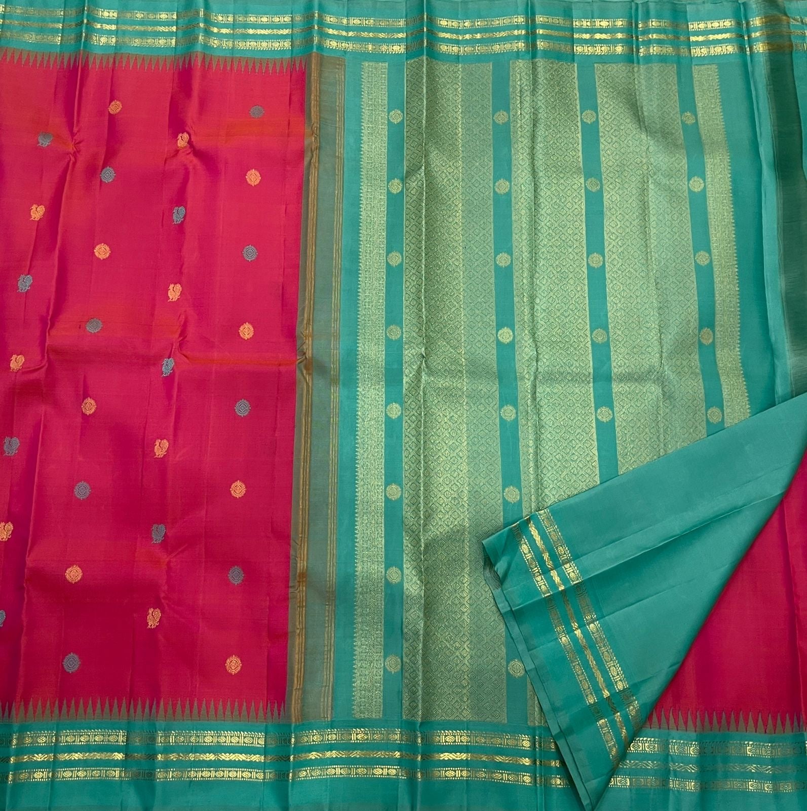 Teal Korvai border of shot colour tomato red pink Kancheepuram saree with Kaal Irangiya temple edge antique gold zari